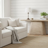 Wooden dining table with a unique design on a white background