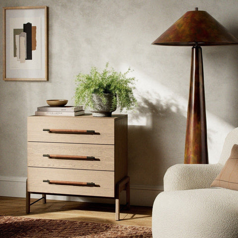 Serge 3 Drawer Dresser made of wheat brown oak wood with dark brown top grain leather and iron black accents