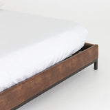 Nelson leather bed in coffee brown made out of top grain leather and iron