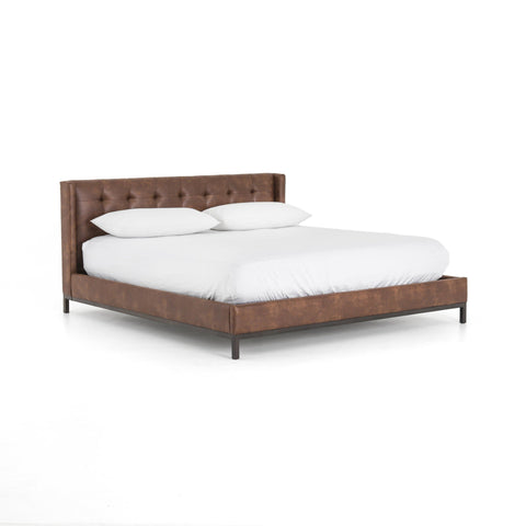 Nelson leather bed in coffee brown made out of top grain leather and iron