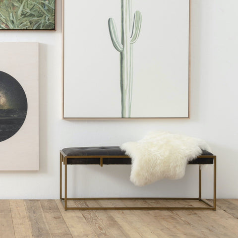 Royce black leather tufted bench brass frame