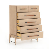 Serge Tall Dresser made of wheat brown oak wood with dark brown top grain leather and iron black accents