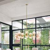 Oliver Chandelier - Radial bubble glass seated globe iron gold leaf frame modern staged view 
