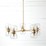 Oliver Chandelier - Radial bubble glass seated globe iron gold leaf frame modern front view 