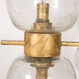 Oliver Chandelier - Radial bubble glass seated globe iron gold leaf frame modern close view 