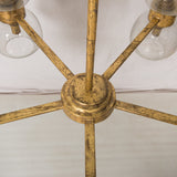 Oliver Chandelier - Radial bubble glass seated globe iron gold leaf frame modern close view 