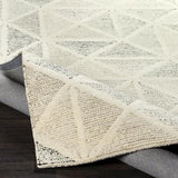Harmony ivory grey geometric wool rug folded