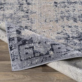 Westbury blue beige faded traditional rug folded